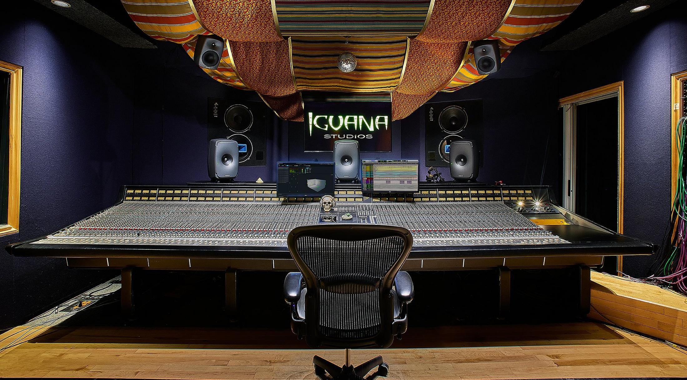 a large room with a large sound board and a chair